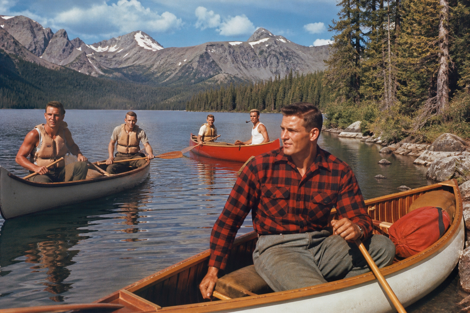Wood-and-canvas canoes on a mountain lake, 1958